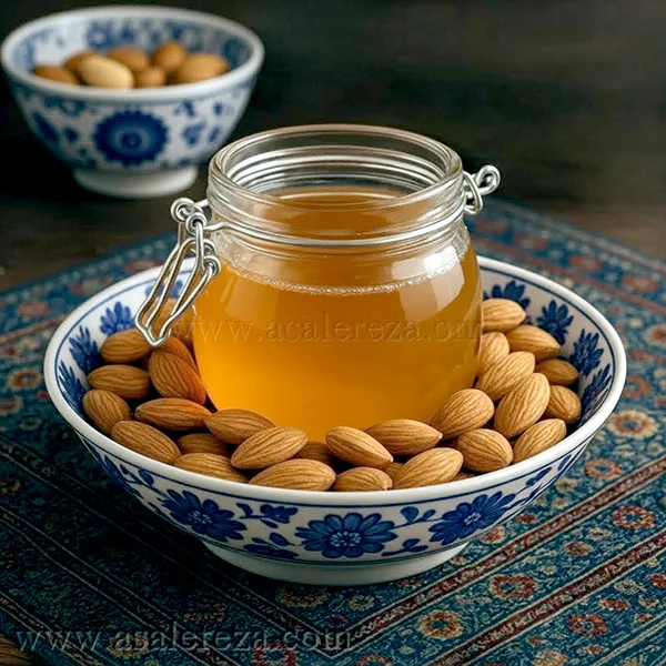 عسل طبیعی در پت شیشه ای در میان مغزهای بادام در یک کاسه سنتی روی فرش سنتی ایرانی در کنار پیاله مغزیجات